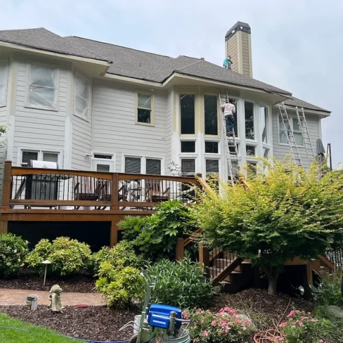 painting a newly built house with white paint